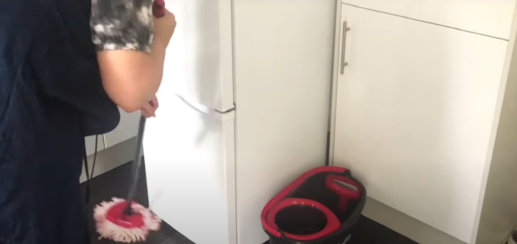 Cleaning Under the Fridge